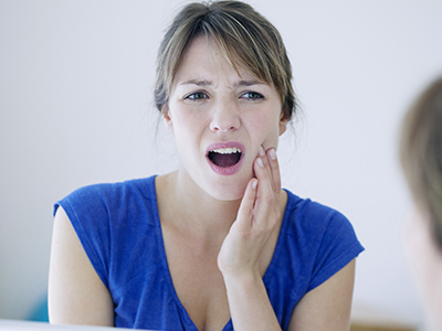 A woman with her mouth open, expressing surprise or shock.